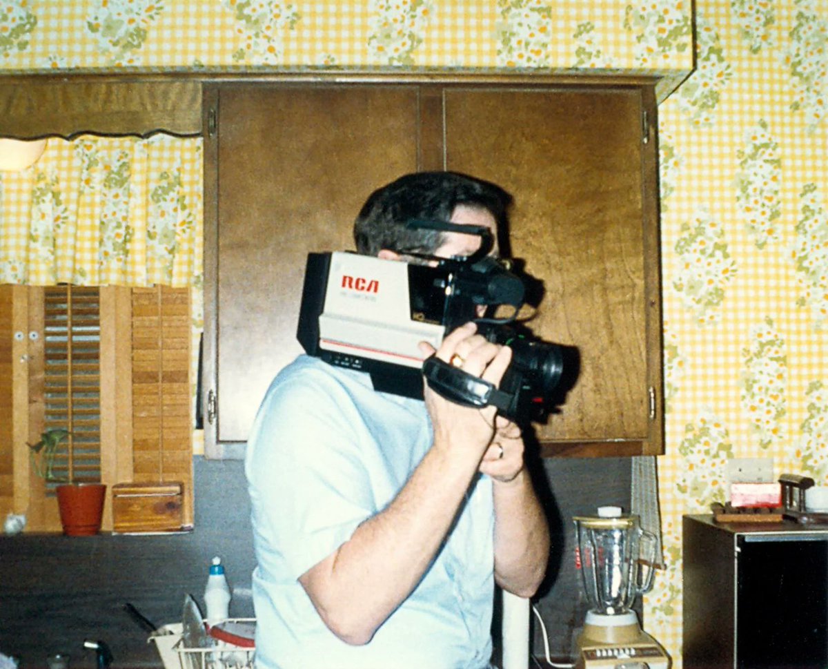 dads being obnoxious with video equipment isn't new, y'all. i think being able to record hands-free so you can engage in the event WHILE recording is super neat, even if it'll look dorky.