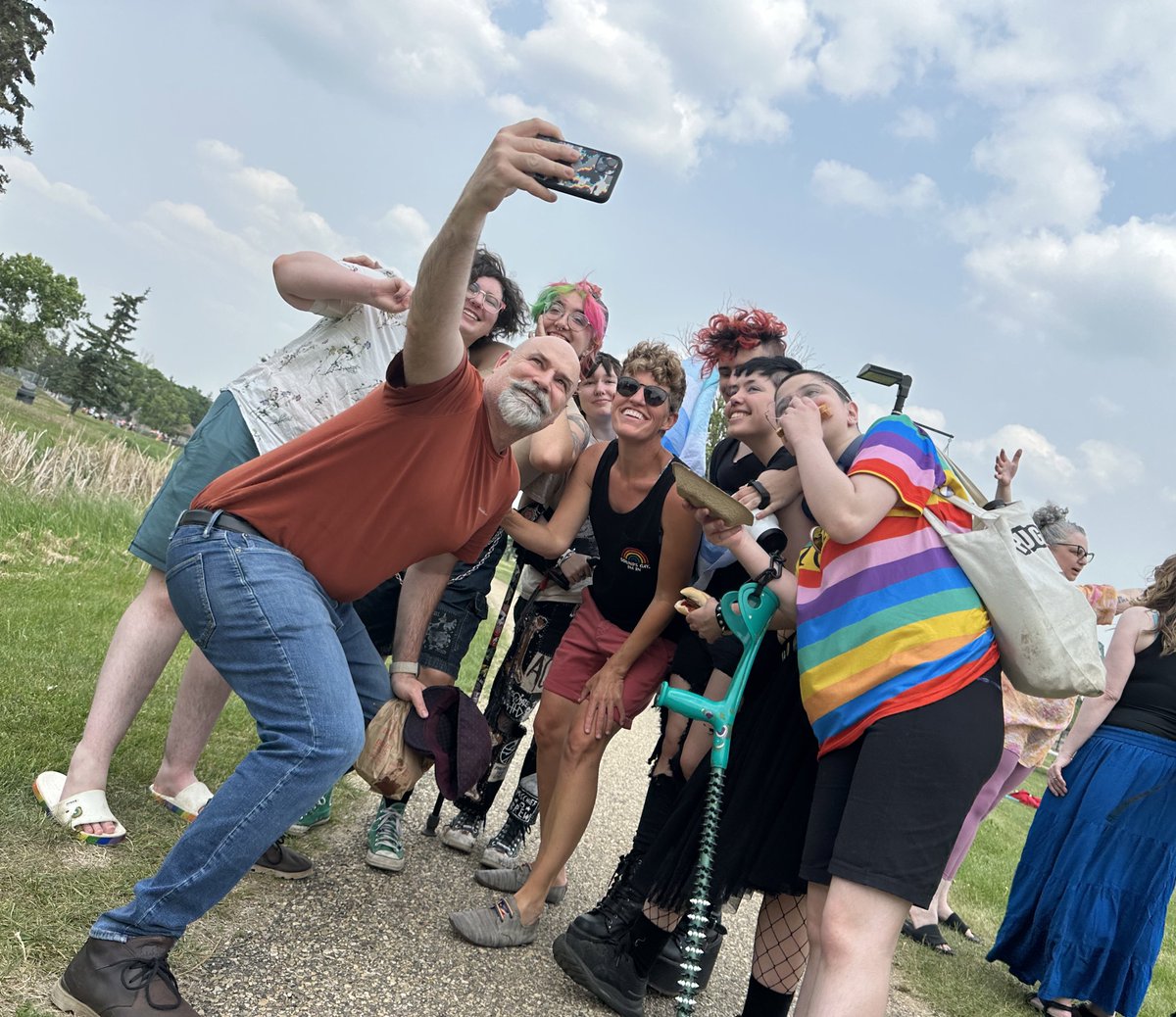 JanisIrwin's tweet photo. In the face of hate, Ponoka responded with love, and came together to show the 2SLGBTQ+ community that they matter, they’re seen, and they’re loved. 

And what an honour it was for me, @CourtEllingson, and @sipiysis to be so warmly welcomed at their first ever Ponoka Pride! 🏳️‍⚧️🏳️‍🌈 https://t.co/bMi69tIExN