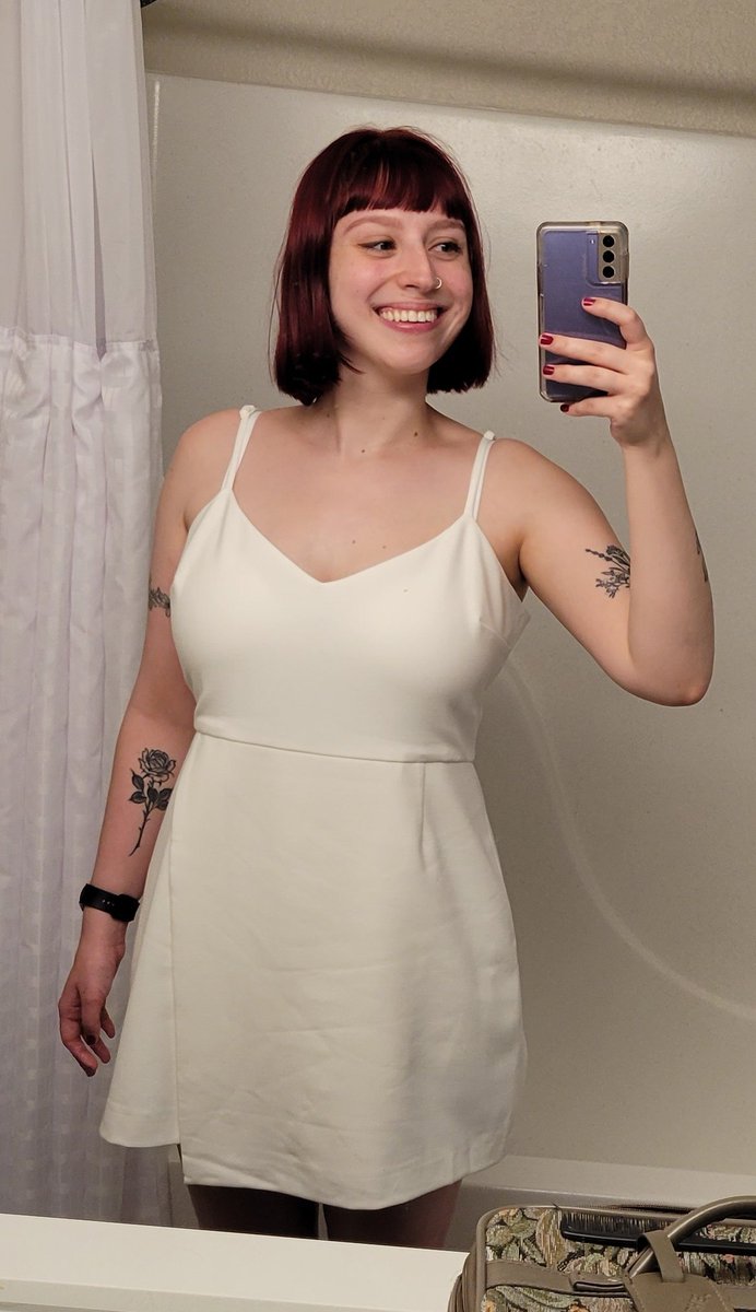 terrible hotel bathroom selfie but look how cute my (first) graduation dress is !!