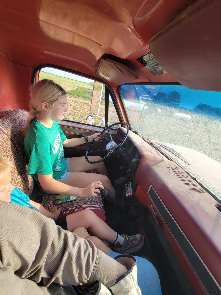 With Oklahoma passing the Farm Permit law, my daughter has been wanting to drive more and get practice in. What better truck to learn stick shift than the ol 74 Chevy C70 grain truck! 
She jumped in and took off like a natural!