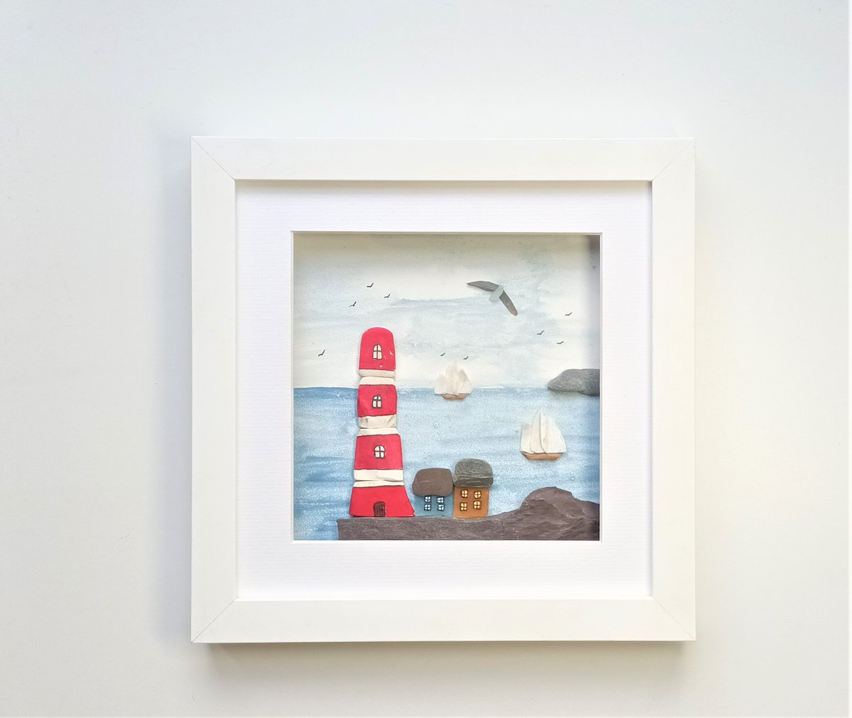 Beachstreetart's tweet image. Sea pottery lighthouse in a 24cm square frame #beachcombed #art #cornwall etsy.com/uk/beachstreet…