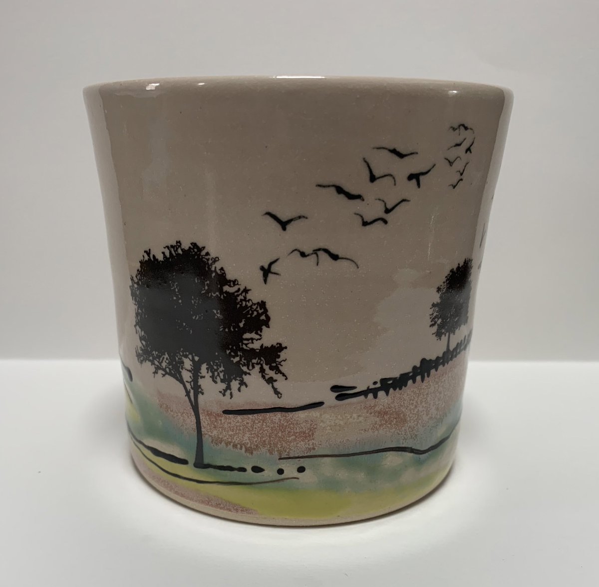 New colour scheme….Pink sky with warmer hills and fuller trees. #handmade #ceramics #pottery #landscapelovers #birds check out my Instagram Instagram.com/Jennifer.barlow