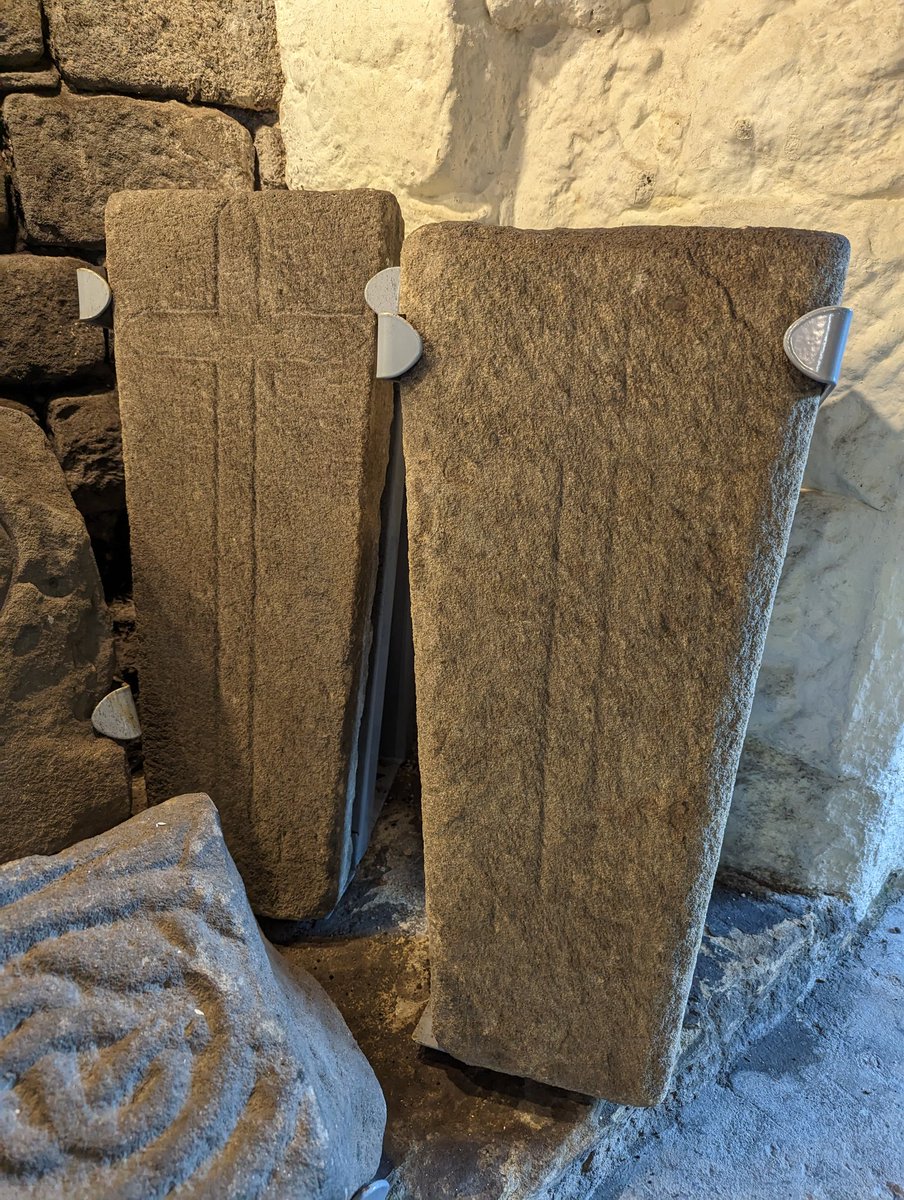 Medieval stonework at the Manor House Museum in Ilkley (W. Yorks). There are parts of grave covers and standing stone crosses found during works in and around the site of the parish church and Manor House, which occupies part of the NW quadrant of the earlier Roman fort.