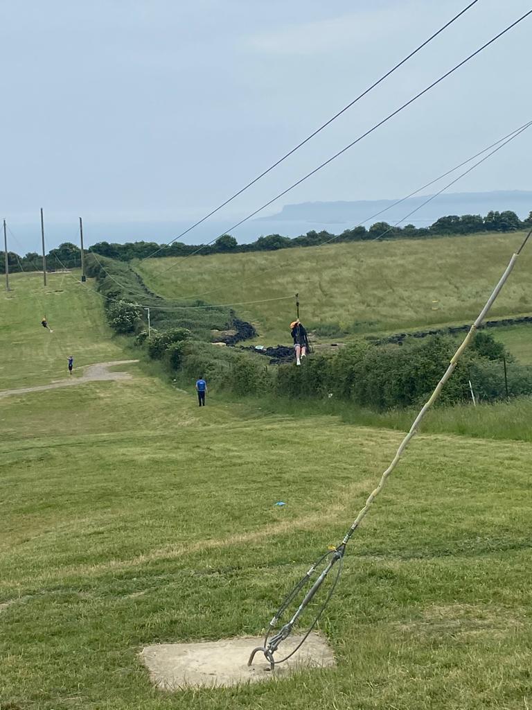 Various groups on zip wire and rifle shooting