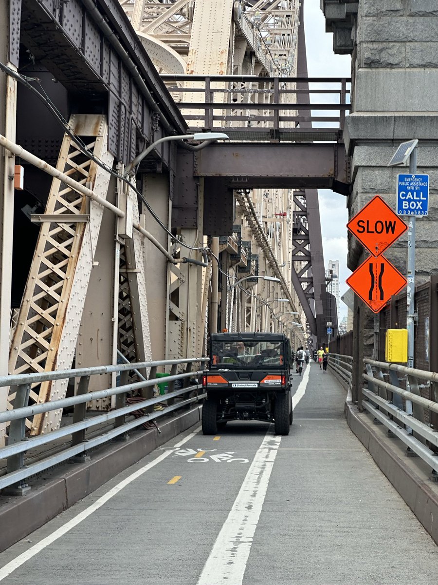slaminben_jamin's tweet photo. @NYC_DOT almost lost my life twice crossing the Ed Koch Bridge because of construction vehicles blocking the overcrowded shared pedestrian bike path. https://t.co/7w0Re9pDYQ