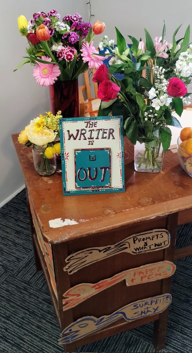 A lovely opening for #sunupfestival2023 in #otley today. So many artists, doing brilliant things. Extra mega thanks to #CaseyOre for painting my 'the writer is in/out' sign to finish my writing desk off. I absolutely love it. I am so excited that my residency has begun.