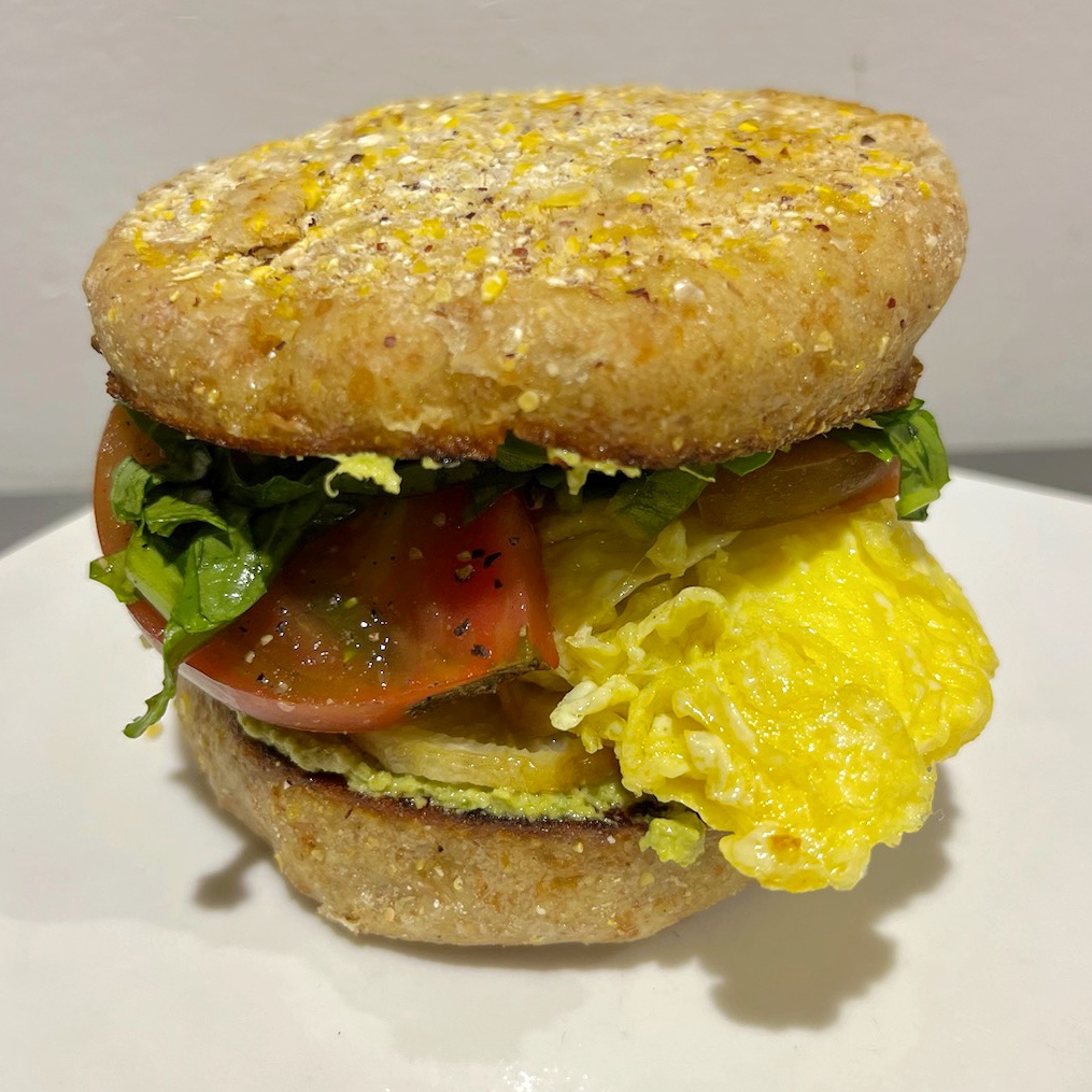 Brunch Special Today:

Heirloom tomato, radish greens, garlic scape pesto, radish slices, egg (or sub tofu to make vegan), all produce from Green Wagon Farm, on house made English muffin.

#spelt #englishmuffin #housemade #heirloom #galicscapes #pesto #brunchtime #eggsammy