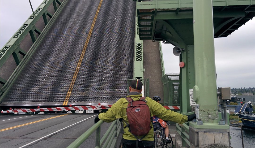 You know you're close to the ocean in Seattle when your bike path gives way to boat passage. 
Ballard Bridge- 
Seattle, WA Circa ~2013