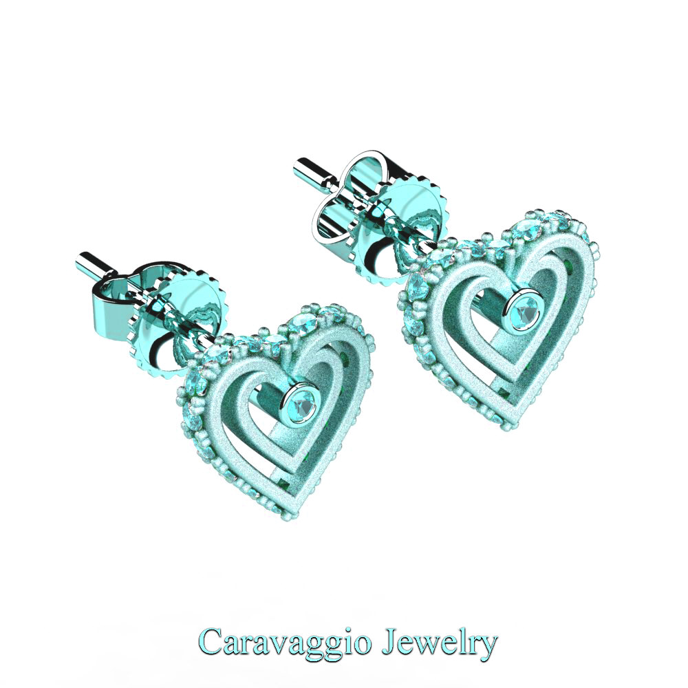 Exclusive Al Arabia 💎 caravaggiojewelry.com/?p=433368 Art Masters Caravaggio 14K Matte Cyan Gold Blue Diamond Heart Stud Earrings E623-14KMCGBLD at Caravaggio™ Jewelry