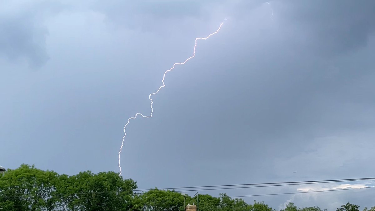 Lightning over #EastGrinstead this afternoon. A top temperature of 29.7°C today, a touch lower than yesterday. Temperature has dropped a bit thanks to the rain, now around 23°C.