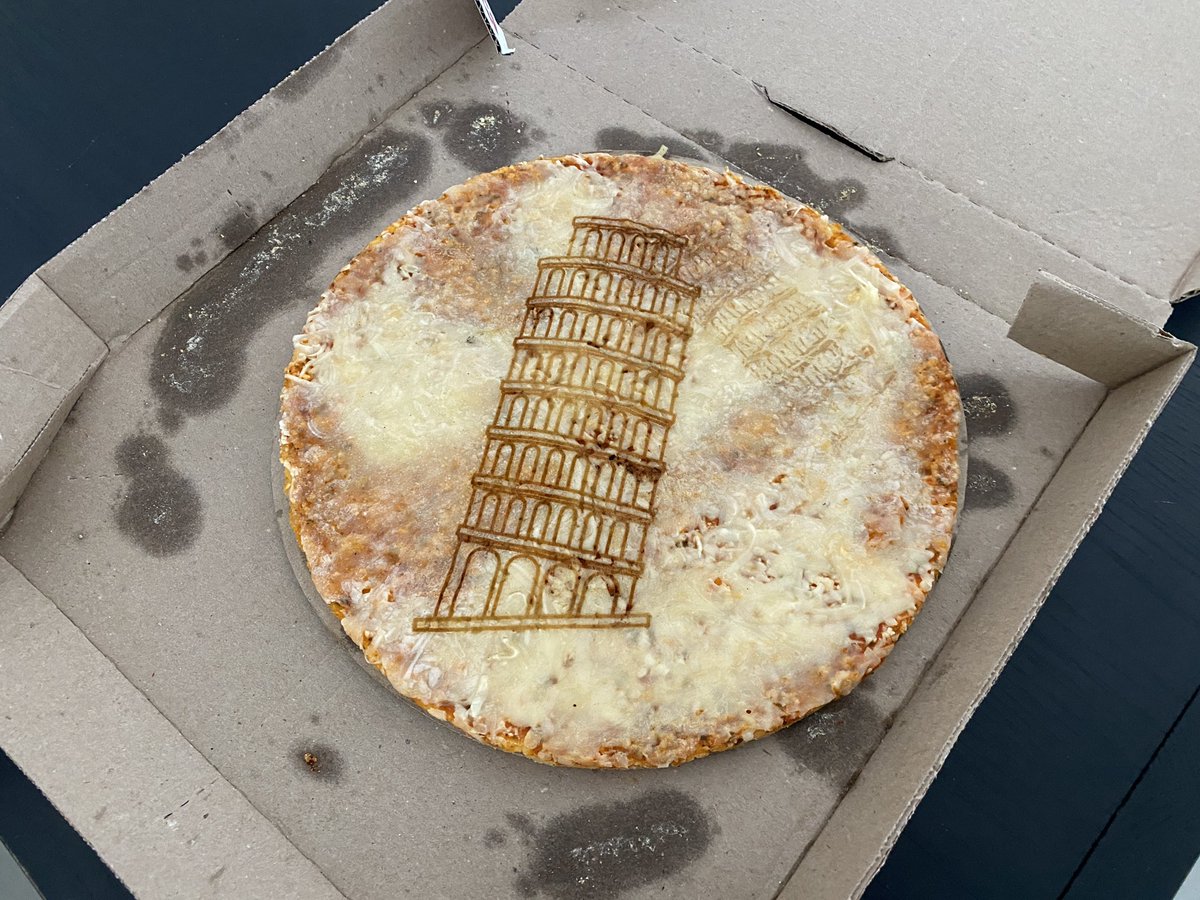 All week a mysterious <a href="/dominos/">Domino's Pizza</a> box was lounging about our office, empty, and people kept trying to put it in the compost bin.
Secretly it was <a href="/masonkirby/">Mason Kirby</a> <a href="/glowforge/">Glowforge</a> plotting a lasered ‘The Leaning Tower of Pizza 🍕’