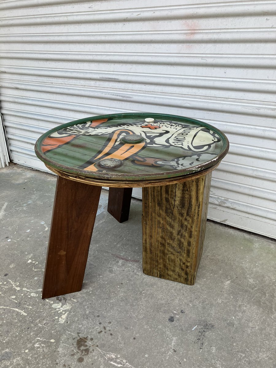 Spray paint, resin on oil drum cap with teak and pine legs, 19 1/4”H x 23 1/4”W. #handmadefurniture #cafecito #MiamiHurricanes