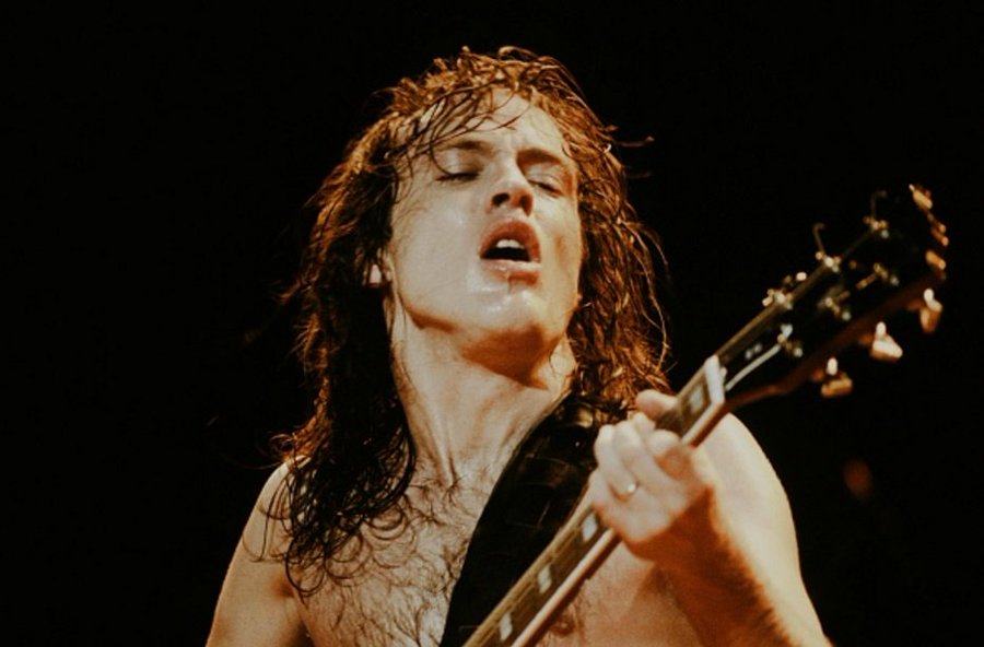 Angus Young live at Nippon Budokan in Tokyo, 1982. Photo by Koh Hasebe.