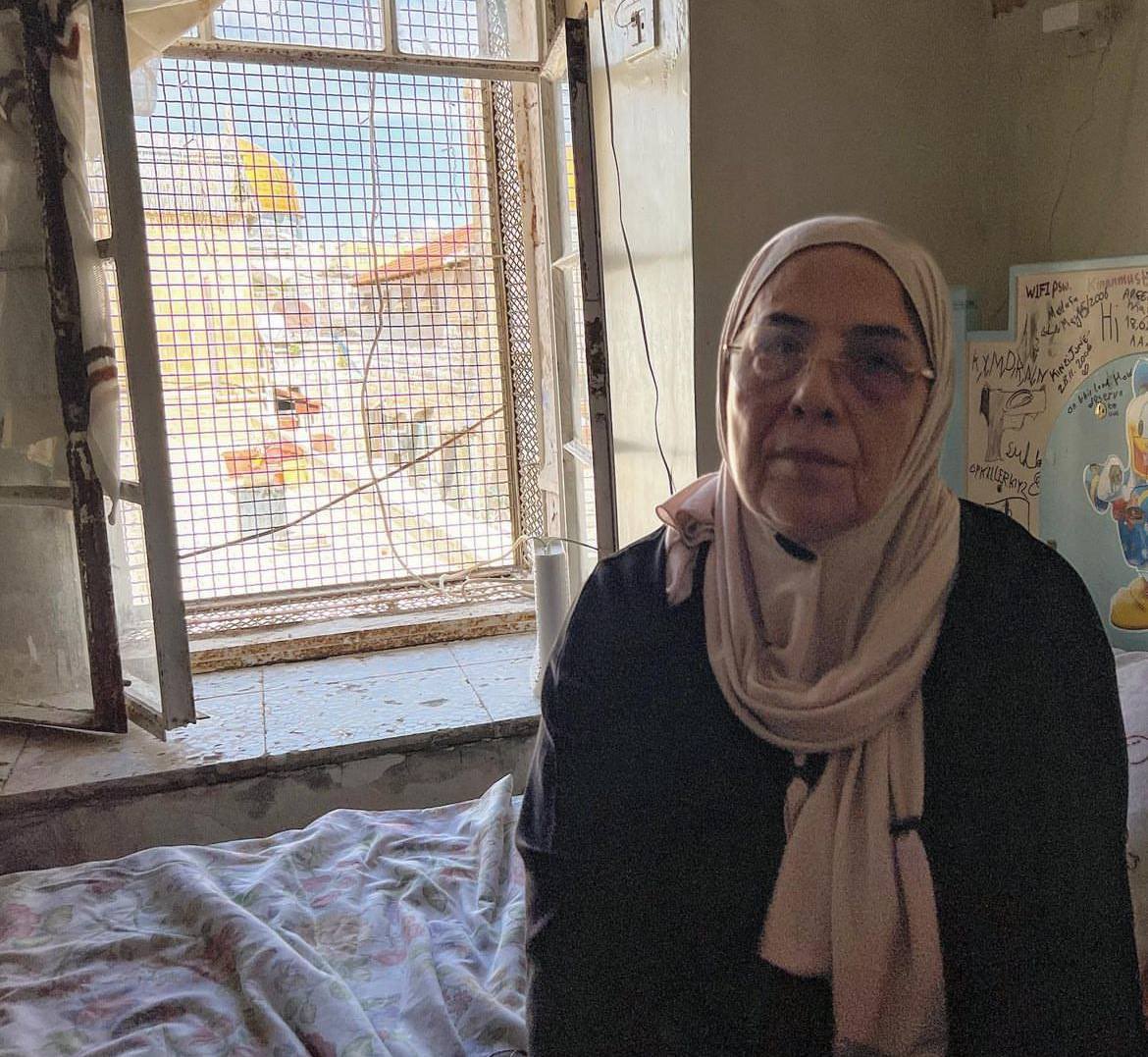 Palestinian Nora Sub Laban, 68, sits in front of the window of her house, which overlooks the Dome of the Rock in Jerusalem’s Old City and counts the hours before she will be forcibly displaced of her house by an Israeli settler organisation on June 11.