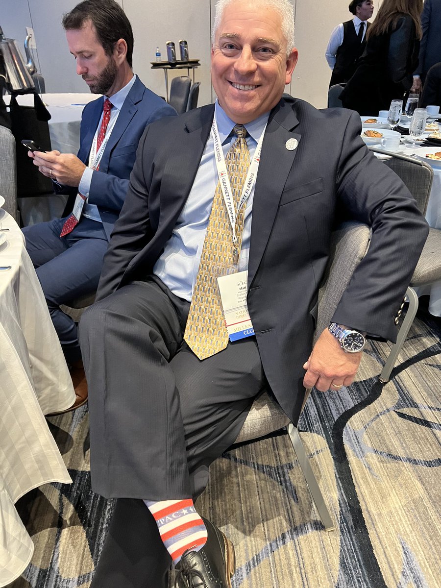 ACECArkansas's tweet photo. Matt Crafton, ACEC Arkansas National Director & President of @craftontull, is attending the @ACEC_National Board luncheon promoting #ACECPAC. He won these socks during trivia. Thanks to all our members who us have contributed to the PAC! #engineers #arkansasengineers #acec https://t.co/iCzCAVbVJf