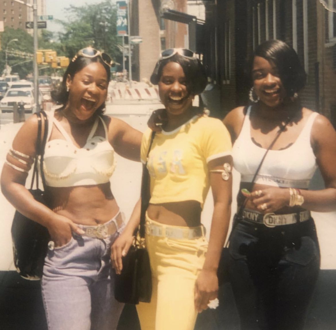 My mom ( middle ) and her two sisters on a trip to New York from London in the 90s . cc @blackndbritishh ,princess dej .