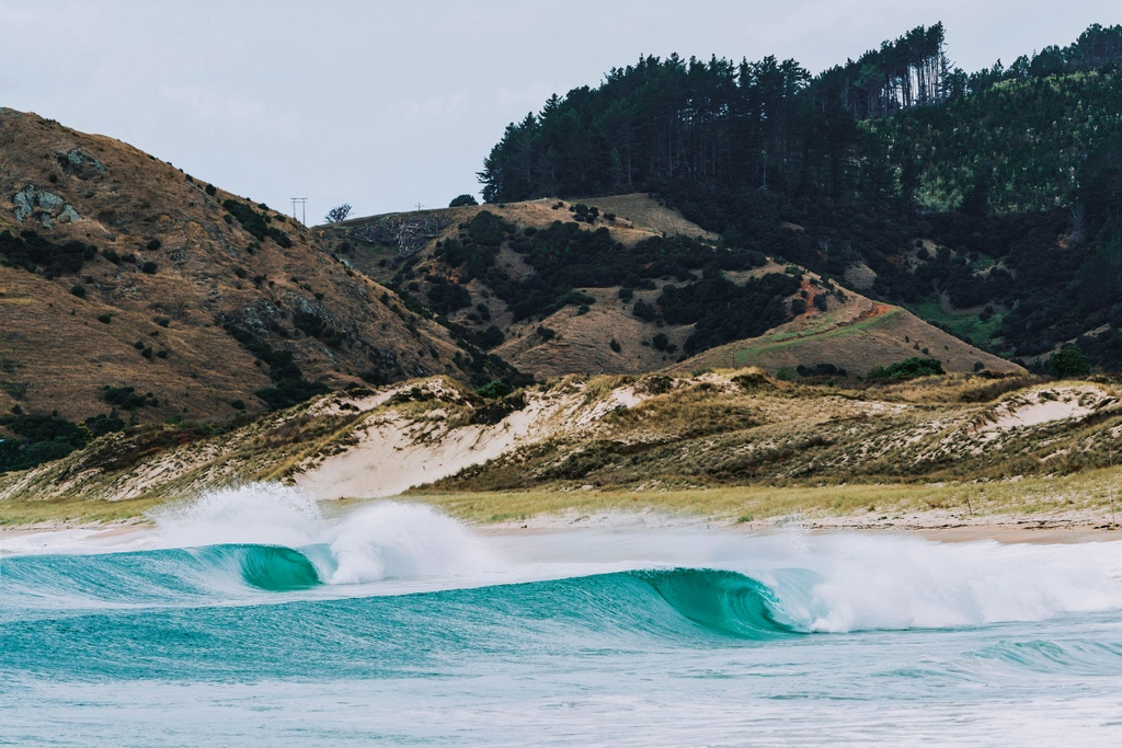 Point-runner imitation in New Zealand. “This is typically a scattered beachbreak,” says shooter Rambo Estrada. “But there was so much south in the swell, it was like a Gold Coast right-hander.”