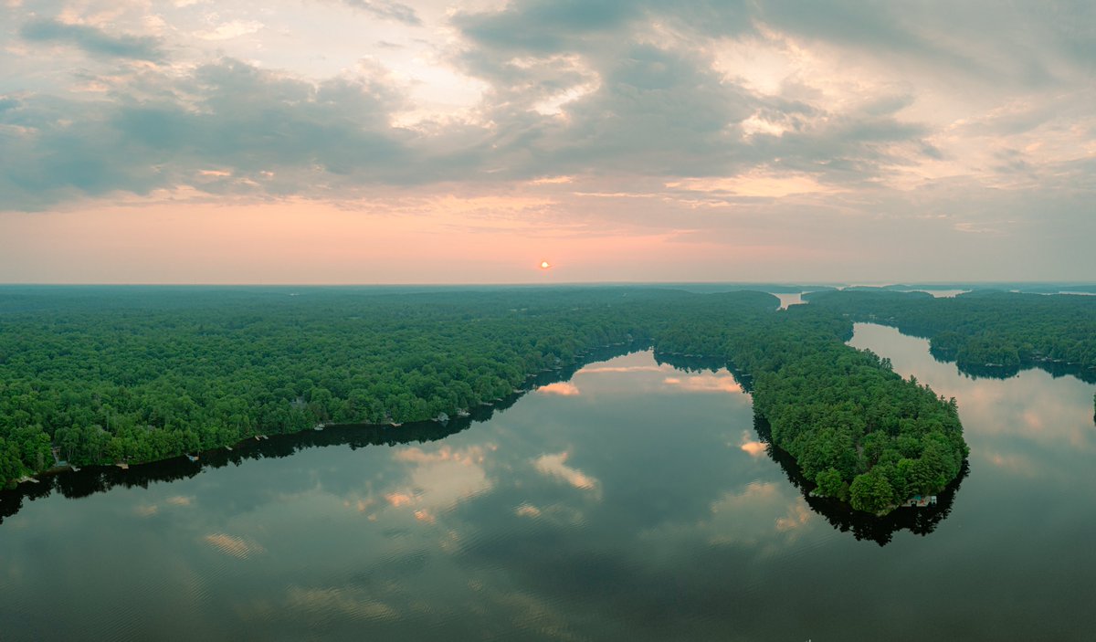 Edited.
Hazy sunset on Bass Lake and a nice reflection...

#muskoka #sunset @DroneHour @StormHour @weathernetwork @ThePhotoHour #dronephotography #reflections #haze