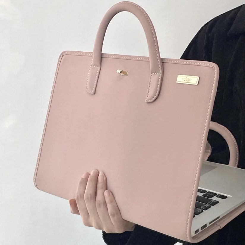 Hand carry laptop case is definitely a must have for college/office use. So convenient and cute!