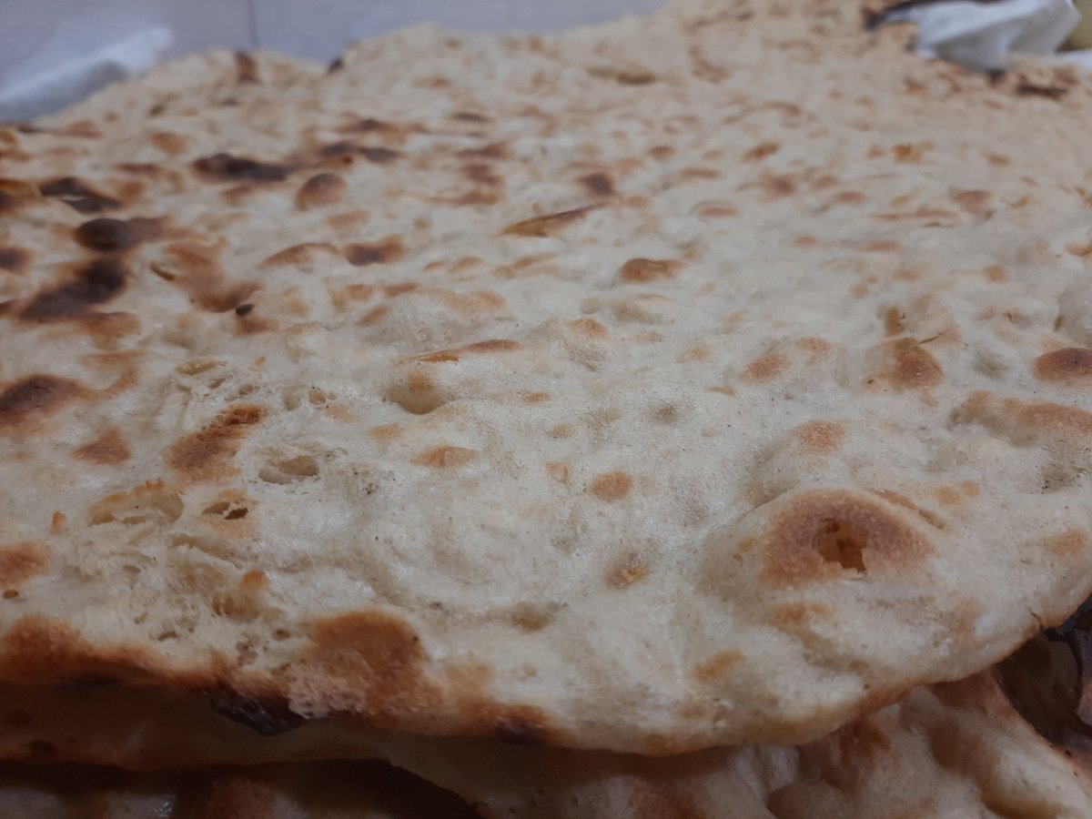 mahsa_sh81's tweet photo. Today, after a long time, I went out to buy bread, this is Sangak bread.  One of the traditional Iranian breads that is baked on  hot stones, hot and fresh from the bakery to your home 😋
#IranianBread #Iran #MondayMood https://t.co/WDTNT0kV6e