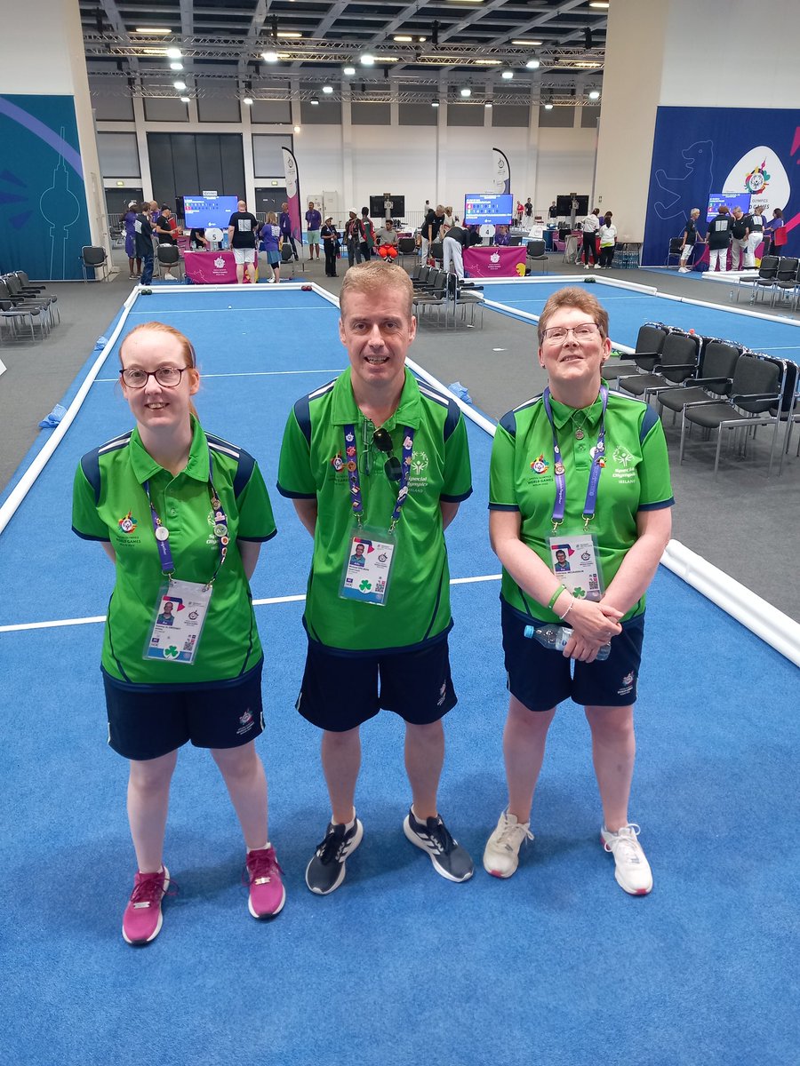 TeamIrlSport's tweet photo. Bocce coach Michael stands proudly with athletes Sammy Jo Sweeney and Caitriona McLaughlin after an intense morning of back to back matches. Now it's time for the finals! #TeamIreland #SOIreland #SOBocce #Berlin2023 #UnbeatableTogether https://t.co/NtdLZ9sizV