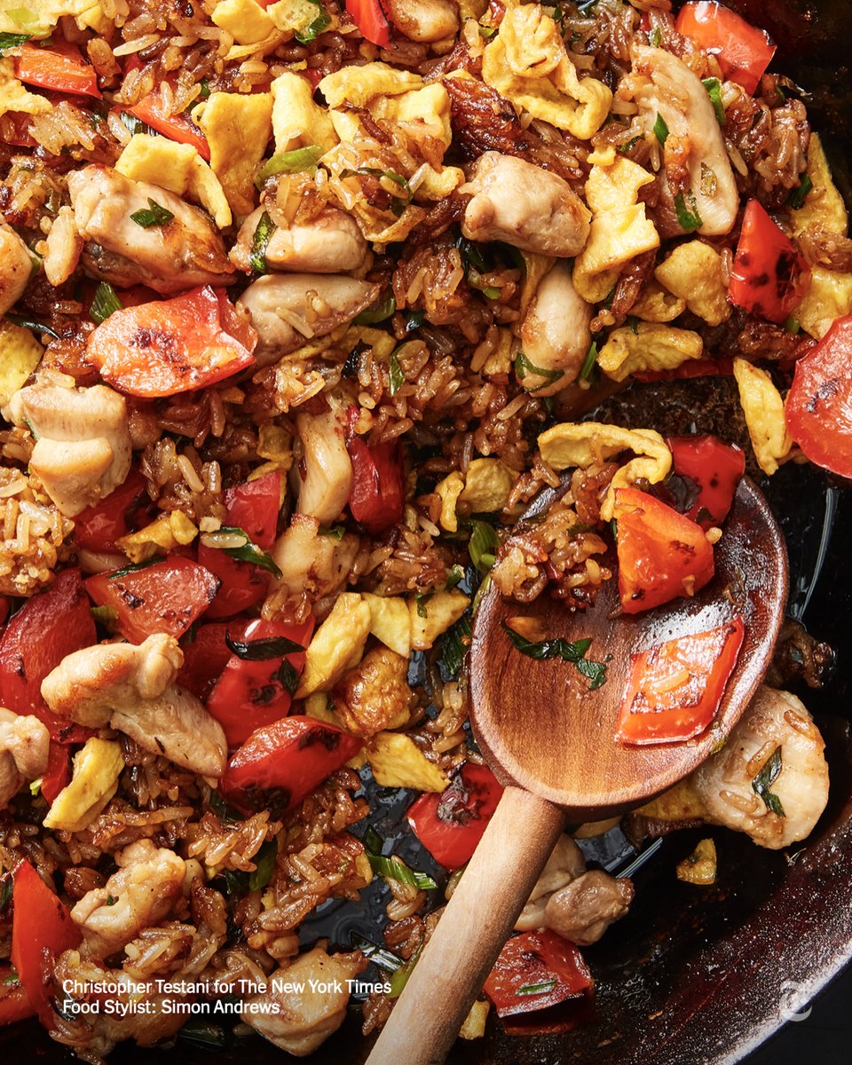 nytimes's tweet photo. After laborers flocked from China to Peru in the mid-1800s, a blend of Chinese and Peruvian cuisine, Chifa, was born. This is a simple recipe for Arroz Chaufa (Fried Rice), a Chifa staple. https://t.co/FlhrhhwxHr https://t.co/bIh0nKRRFM