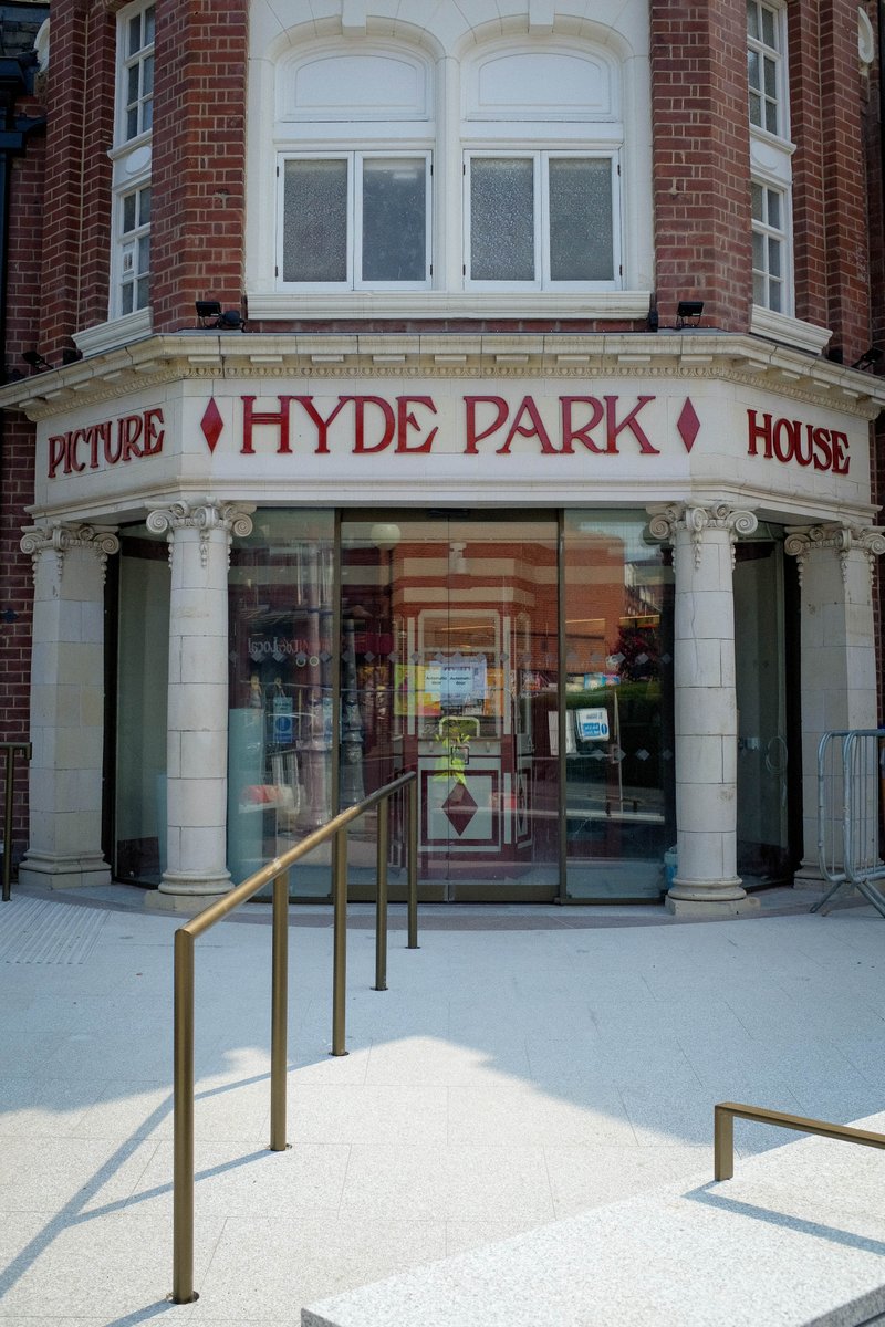 Picture House façade with new ramped entrance and railings and new automatic glass doors for thermal lobby.