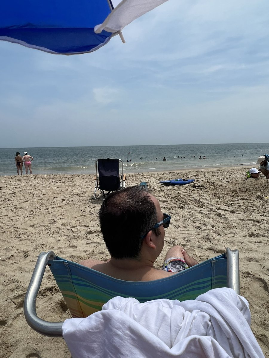 My current view, with my husband’s head in the foreground. ❤️ #rehobothbeach