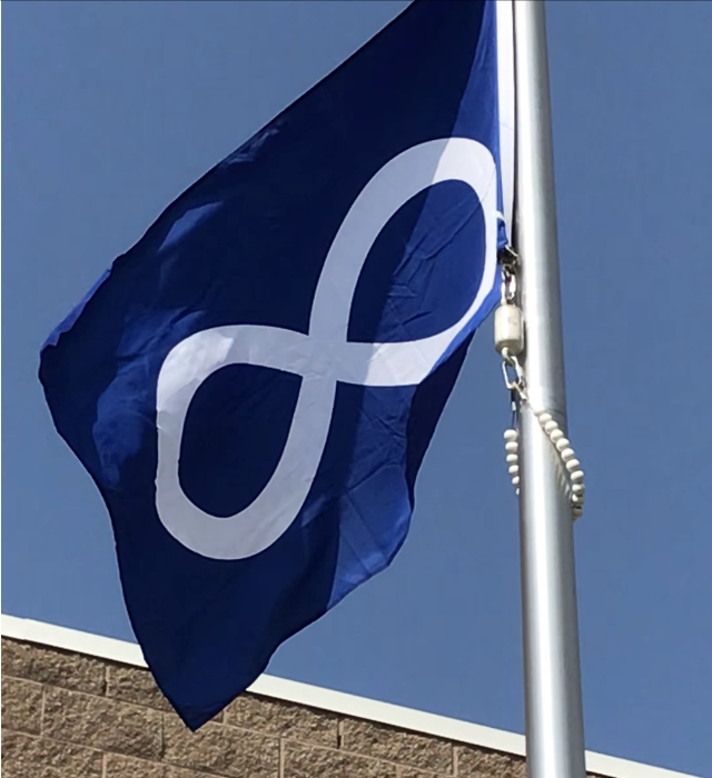 OLOLCRUSADERS's tweet photo. On this day in 1816, the Metis defended their right to free trade as an Indigenous people and officially became a Nation, flying their flag for the first time. This victory, a pivotal moment in Métis history, is celebrated annually. Lourdes does so for Indigenous History Month. https://t.co/5y7xaQKIJR