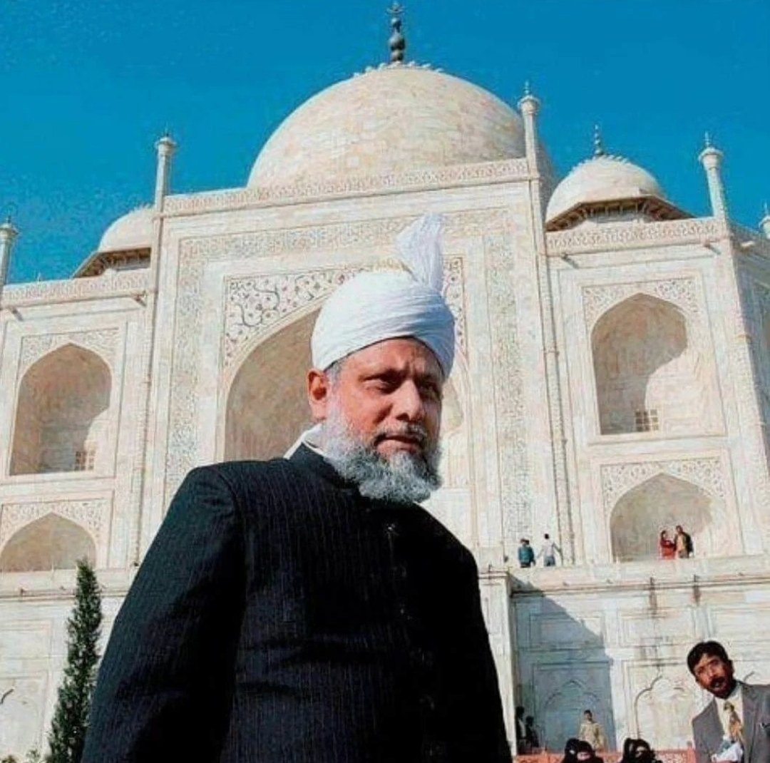 Absolutely remarkable photo of Hazrat Khalifa Tul Masih V (Hazrat Mirza Masroor Ahmad) in India, 2008, in front of the Taj Mahal.

Taj Mahal was built by Mughal Emperor Shah Jahan in memory of his wife Mumtaz Mahal with construction starting in 1632 AD and completed in 1648 AD