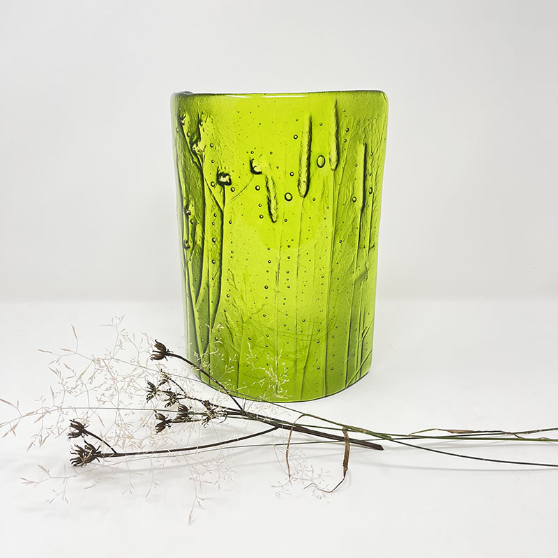 Summer Grasses curve by Hilary Shields is a free standing iridised glass curve with hollow relief of summer grasses. Ideal for a sunny window sill or candle. #artforyourhome #artinspiredbynature #colouredglass #glasswork #glassartists #fusedglassart #tonbridgehighstreet #summer