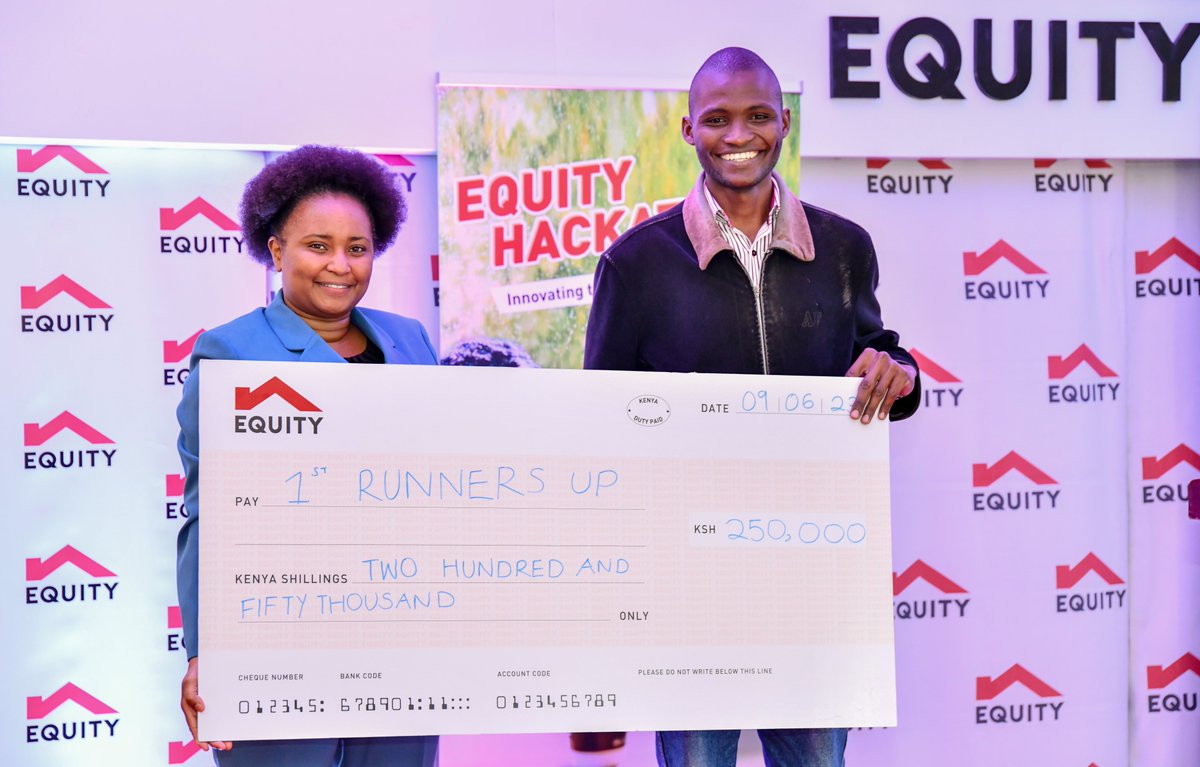 KeEquityBank's tweet photo. Equity Group Director, Strategic Human Capital Dr. Beth Waweru (Left) presents the 1strunners-up with a dummy cheque of Ksh250,000. Charles Muvaka (Right) of Team Equi-fly emerged 2nd under the Social Outcomes category. #EquityHackathon https://t.co/WnjSoPwydx