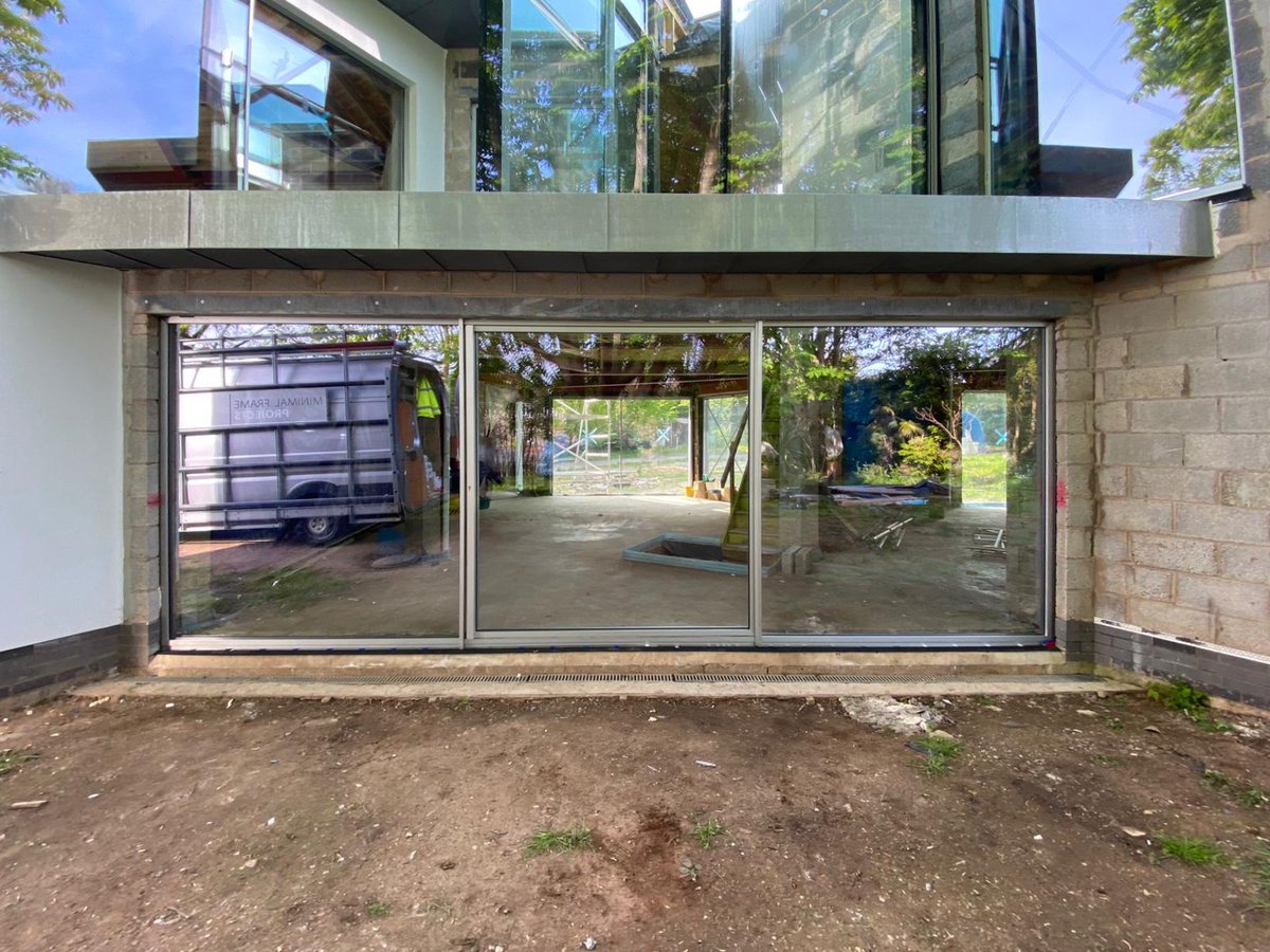 mfpukltd's tweet photo. Our External #PivotDoor System is a great modern alternative to sliding or bifold doors, made with a minimal aluminium frame that can accommodate glass panels up to 12m wide, with a customisable pivot position.
#interiordesign #window #structuralglass #homeinspo https://t.co/d0fbYPLqy2
