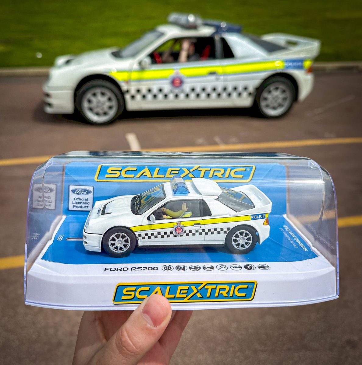 Scalextric's tweet photo. 📢 The highly-anticipated Scalextric @EssexPoliceUK Ford RS200 has arrived and is now in stock!

🚨 Designed to perfection, it captures every detail of the iconic police car.

Get yours here 👉 https://t.co/64jnrJlz4g

#EssexPoliceRS200 #RPU #VisionZero @EPRoadsPolicing https://t.co/ppspJR7ny4