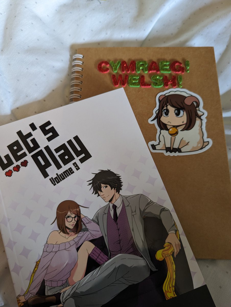 weebodon's tweet image. let's play vol 3 by @mongrelmarie arrived just in time so i can put my bunty sticky on my welsh learning notebook !!! aaa i love it