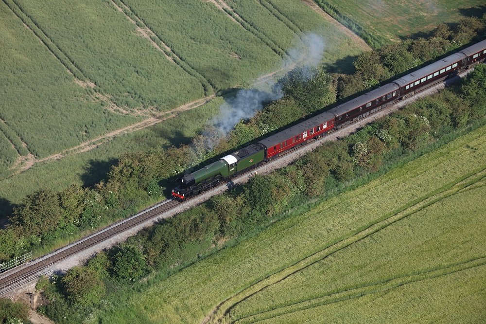 Aerial shot of Flying Scotsman hauling the Royal Train along the North Yorkshire Moors Railway.