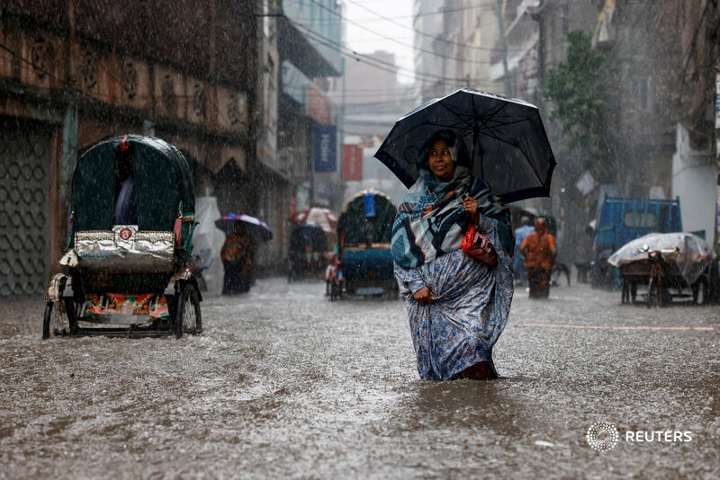 Reuters Pictures (@reuterspictures) on Twitter photo A woman holds an umbrella while walking along a flooded street during heavy rain in Dhaka, Bangladesh. More photos of the day: bit.ly/3NpEvYv 📷 <a href="/ponirimages/">M Ponir Hossain</a> A woman holds an umbrella while walking along a flooded street during heavy rain in Dhaka, Bangladesh. More photos of the day: bit.ly/3NpEvYv 📷 <a href="/ponirimages/">M Ponir Hossain</a>