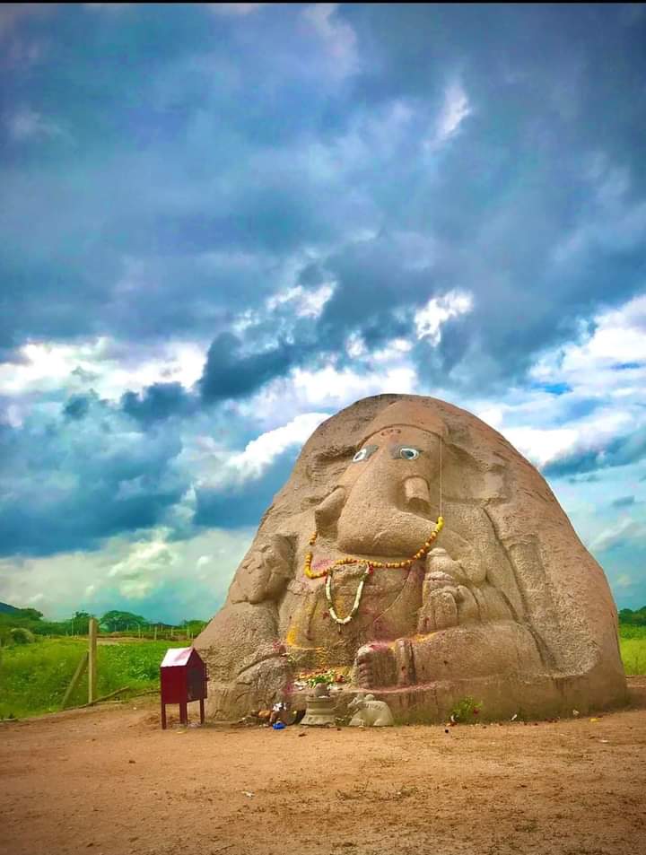 11th Century monolithic murthi of Ganesh in Avancha village, Telangana. This unfinished 30 feet high beautiful murthi was installed by Chalukya King Tailapu. His untimely death led to the incomplete carving.