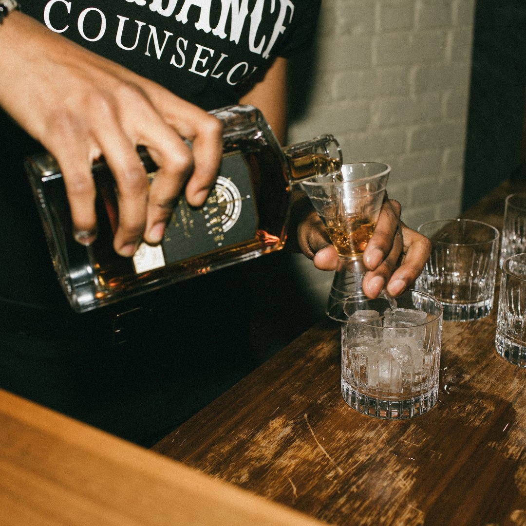 As the golden liquid cascades into the glass, a symphony of flavors and aromas awaits. Each drop tells a story, a tale of craftsmanship and dedication, as it swirls and settles.