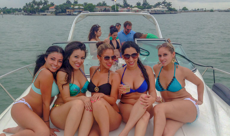 The girls pose for a photo on the bow of the White Ice yacht.  #bachelorette #miami