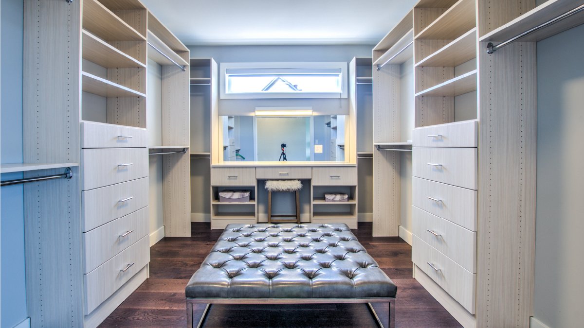 We loved created this custom closet! 
Complete with a mirror, sitting area and plenty of storage! What a place to start off your morning to get ready.

#dreamcloset #closetdesign #customhomes #customhomebuilder #designinspo