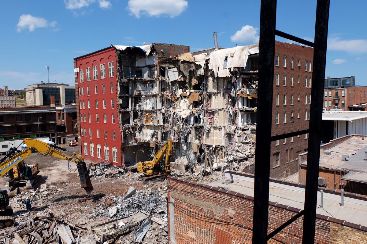 I shimmied out onto a fire escape for one of em. A resident of an adjacent building was pulling her stuff out of it on the dl. Said her building was in as bad of a shape as the one that fell. Added, “I’m on the top floor, I bet the pictures are great up there.” She was right.