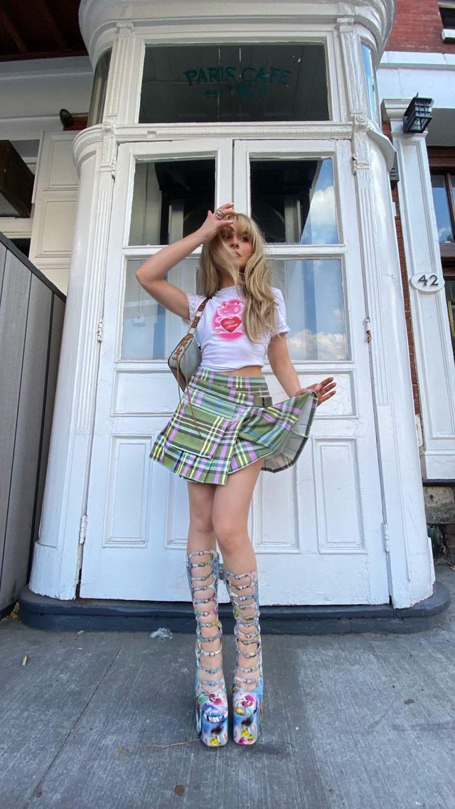 Sabrina Carpenter's Miniskirt and Platform Boots on Tour