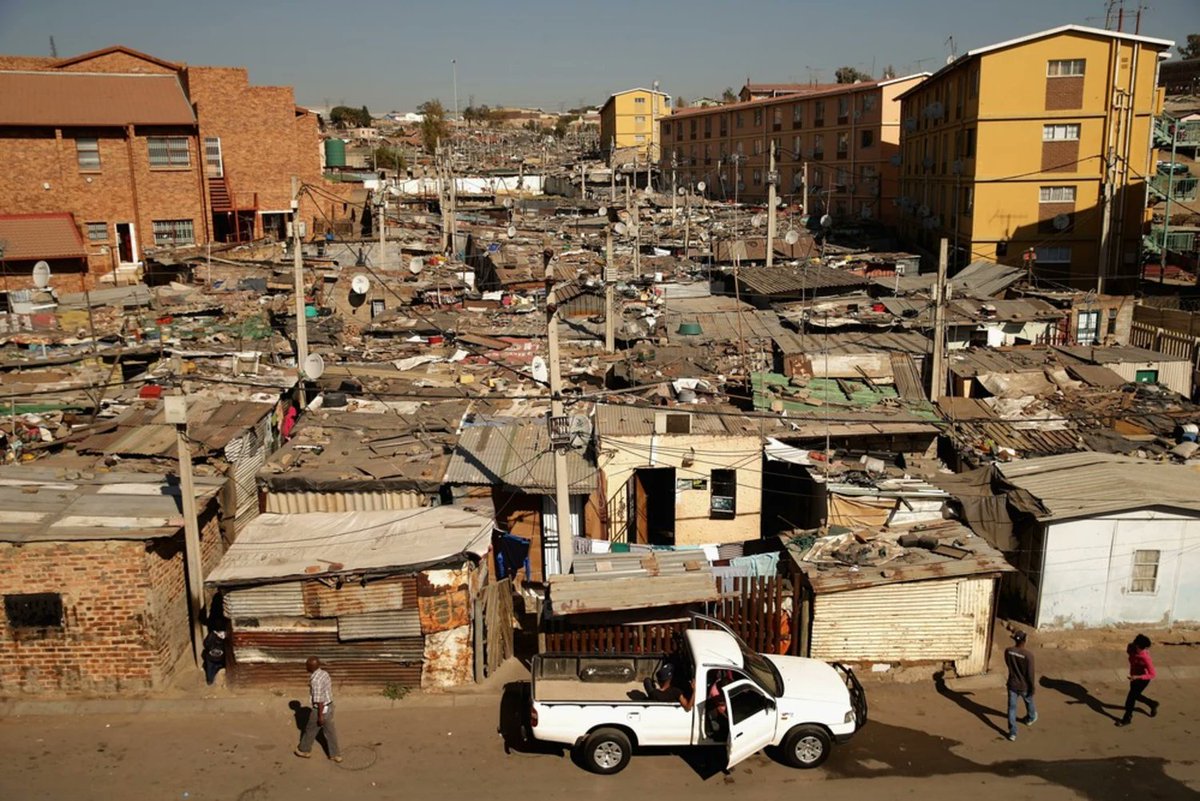 KasiEconomy's tweet photo. It is estimated that around 700 000 people are staying at Alexandra township, the area size of Alex is 7km²

If you minus the area size of schools, streets, churches, shops and other amenities, each person is limited to around 3 to 4sqm of land.  A standard prison cell is around 6sqm