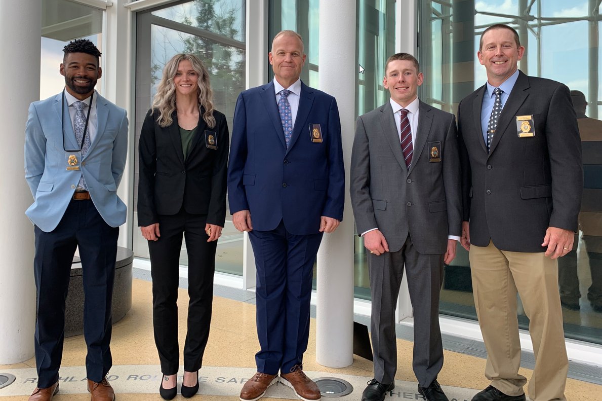 On Friday, June 9th, we celebrated the graduation of four Parole and Probation Officers from the Law Enforcement Training Academy. Dakotah Mansfield, Marinna Marsh, Andrew Patterson, and Matt Hendrickson received their Peace Officer license and their NDPP badge. Congratulations!