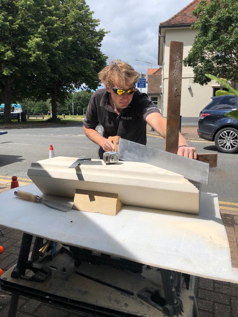 @ZigguratTen Cutting the angled end off a coping stone