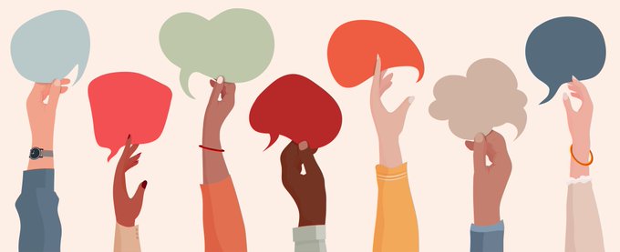 A diverse group of arms are seen raising several speech bubbles of different shapes and colours.