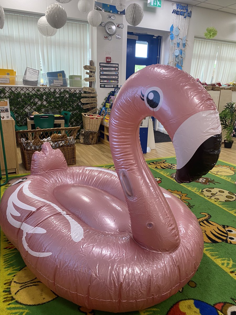 Another normal day in #EYFS with our seaside inflatable flamingo! The perfect place to lounge and read a good book! #readingforpleasure #flamingos