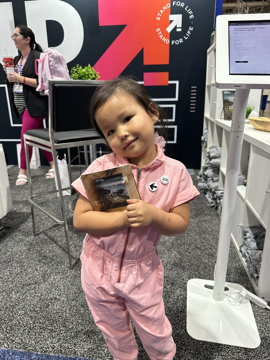 LaurenAMcAfee's tweet image. Best booth worker: Zion! She was loving it. #sbc23 #standforlife