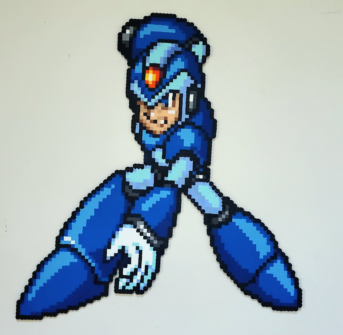 I've got more to share today. Here's the Maverick Hunter X from Mega Man X! Been wanting to do this one for a while. Pick it up in person this weekend at @RaleighRetro Summer Expo!

#MegaManX #MegaMan #Perler #PerlerBeads #PixelArt